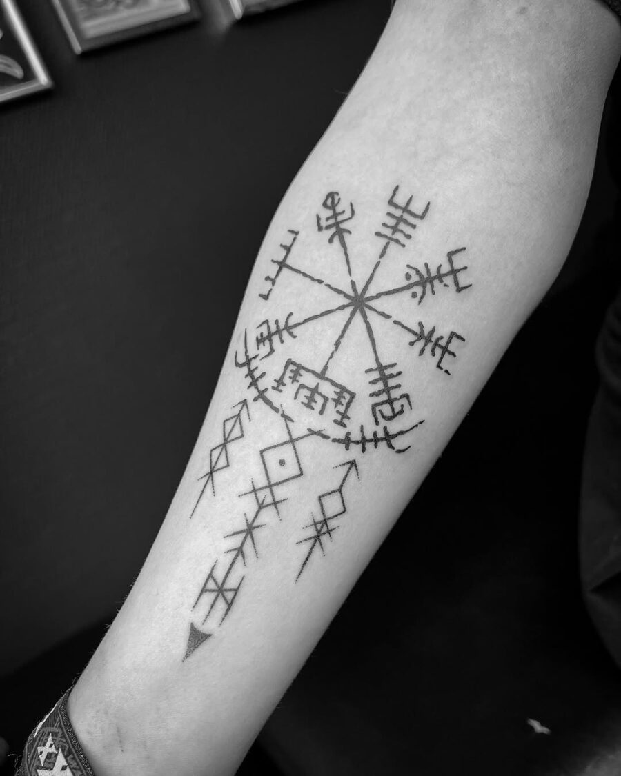Intricate vegvisir tattoo design on forearm