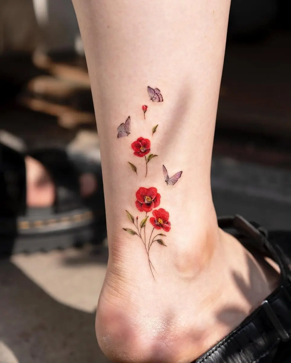 Enchanting camellia tattoo with delicate butterflies