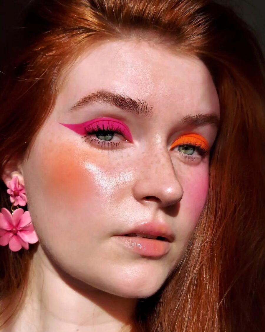 Bold pink eyeshadow with vibrant accents