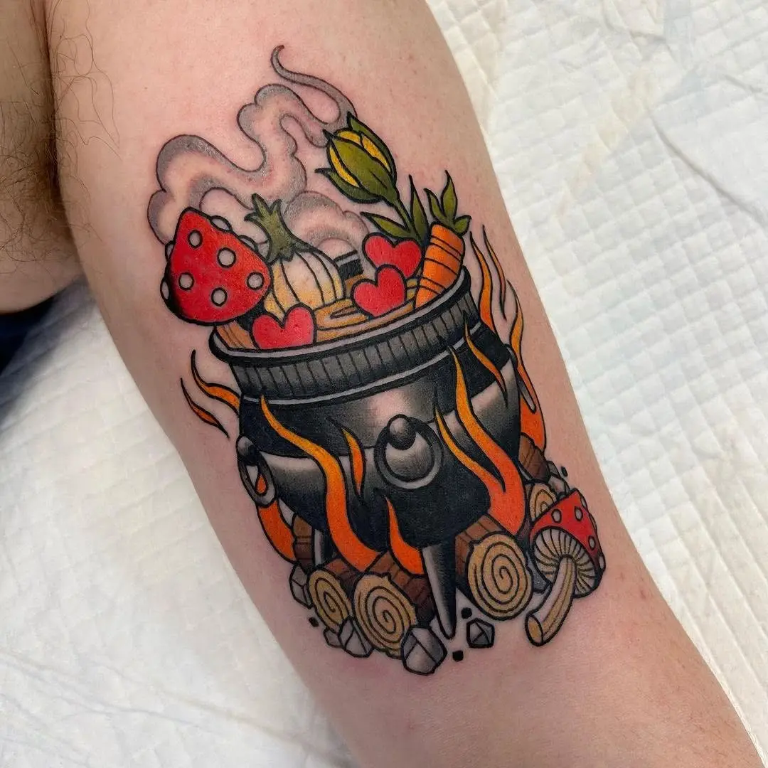 Colorful vegan cooking tattoo celebrates plant-based lifestyle