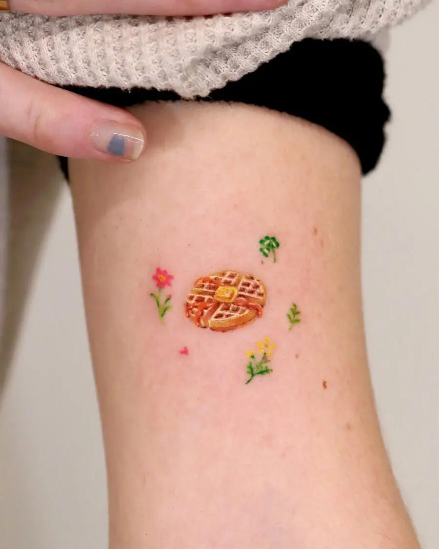 Charming waffle tattoo with floral accents