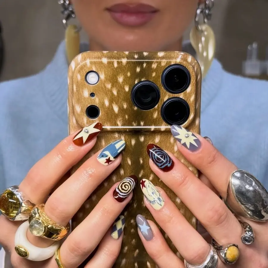Unique western nail art with vibrant designs