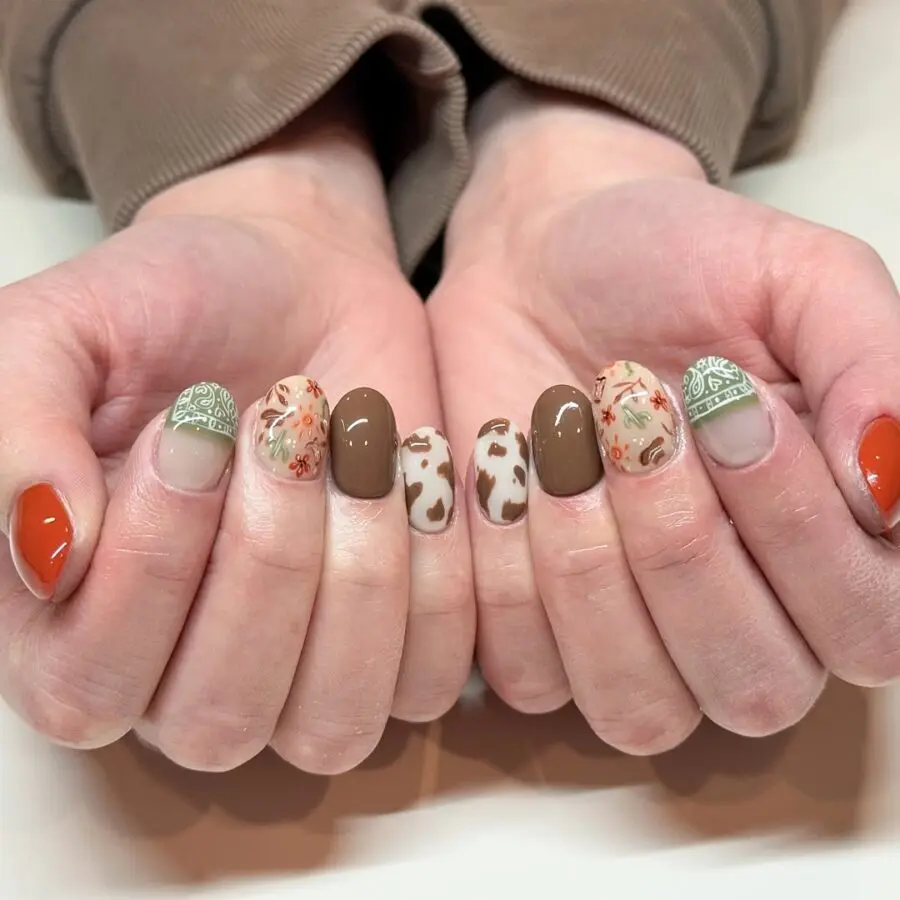 Vibrant Western Nail Art with Floral Patterns
