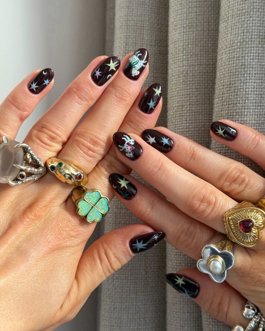 Chic dark nails with star designs