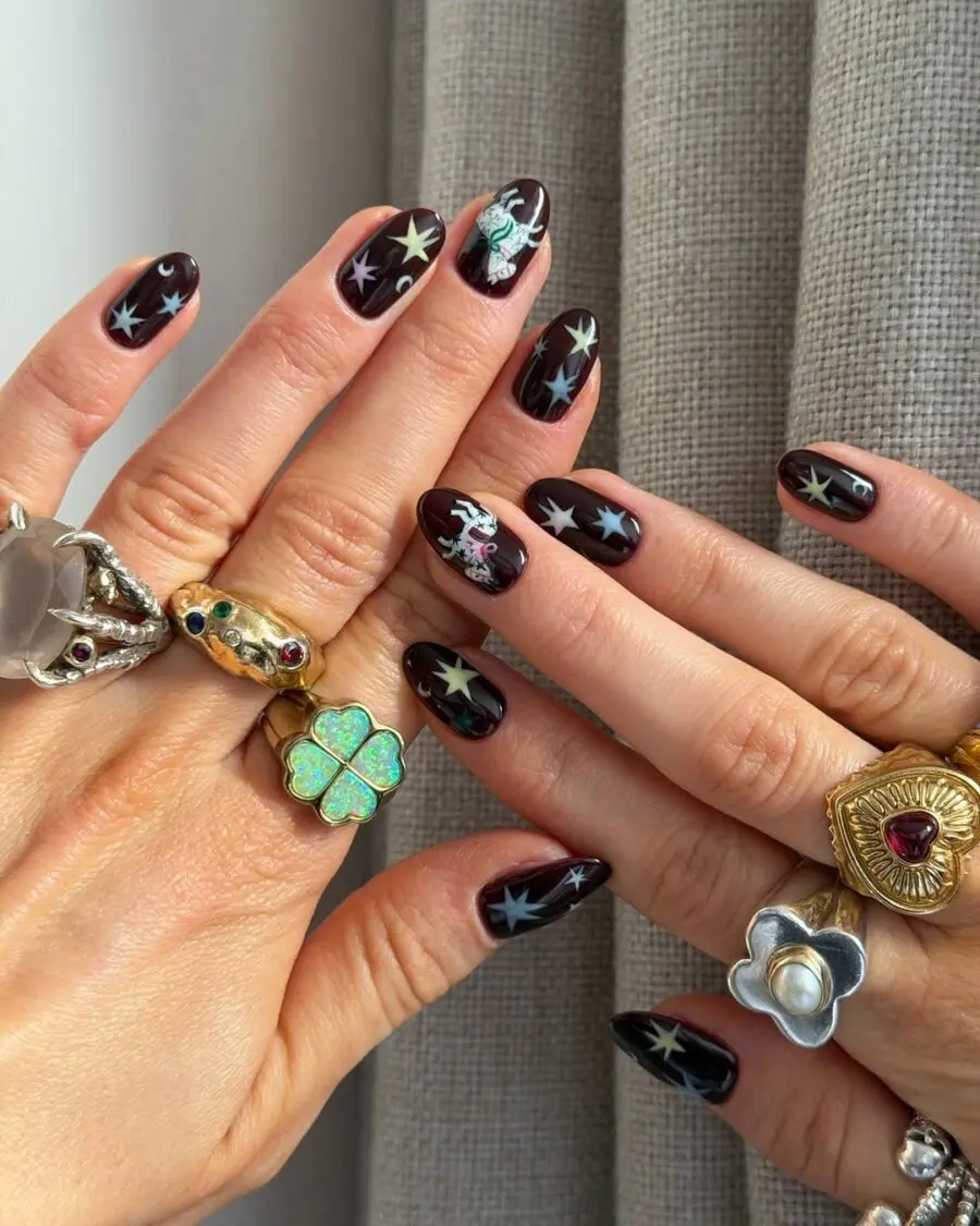 Chic dark nails with star designs