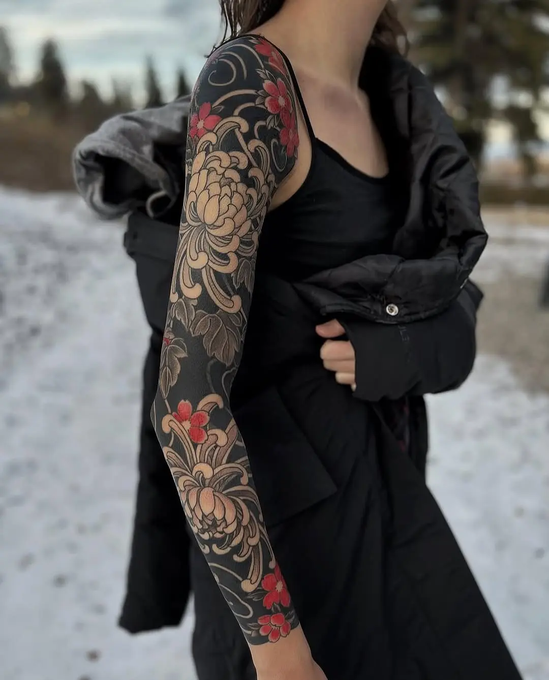 Intricate Yakuza Tattoo Embellished with Flowers