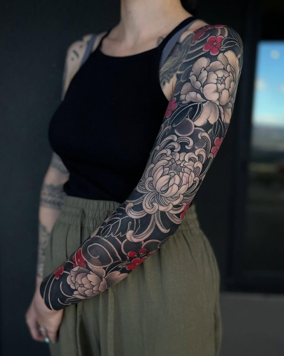 Intricate floral yakuza tattoo sleeve design