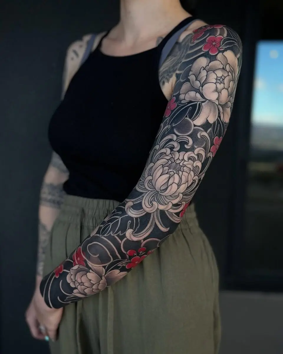Intricate floral yakuza tattoo sleeve design