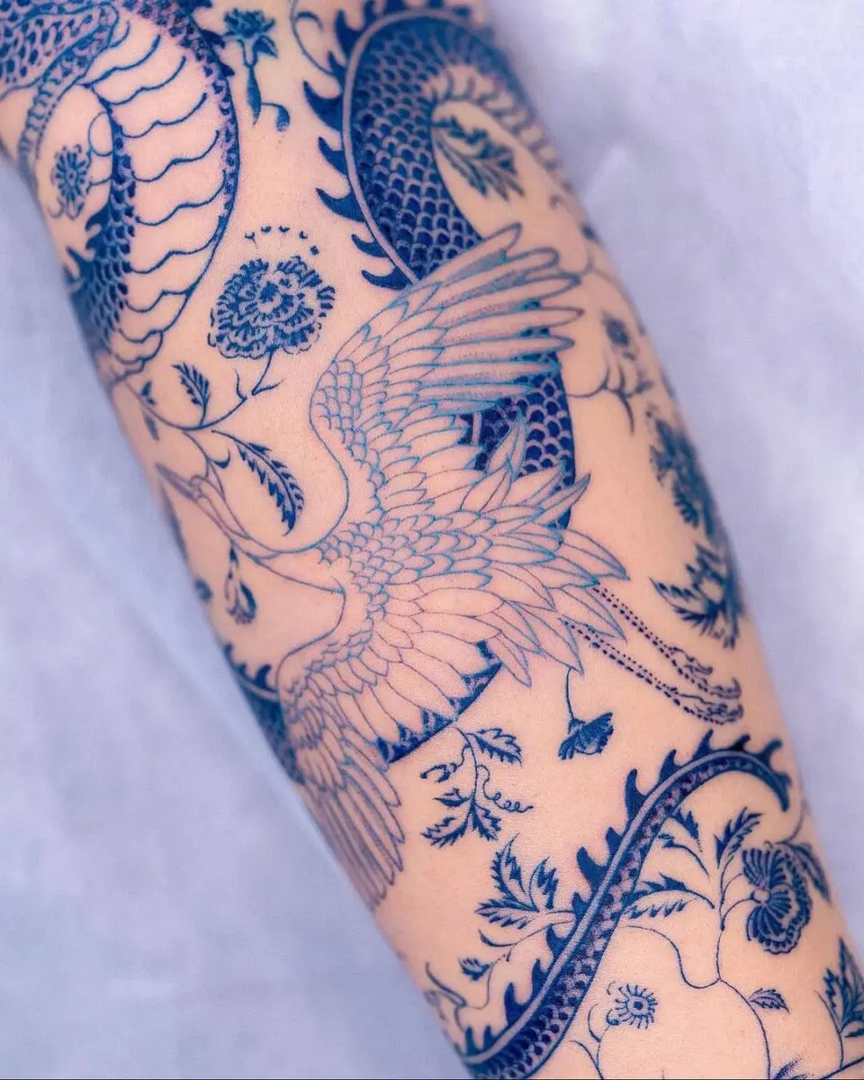 Intricate blue yakuza tattoo sleeve design