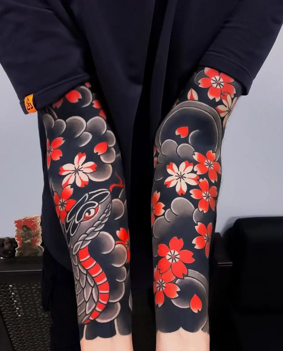Striking snake and flower yakuza tattoo design