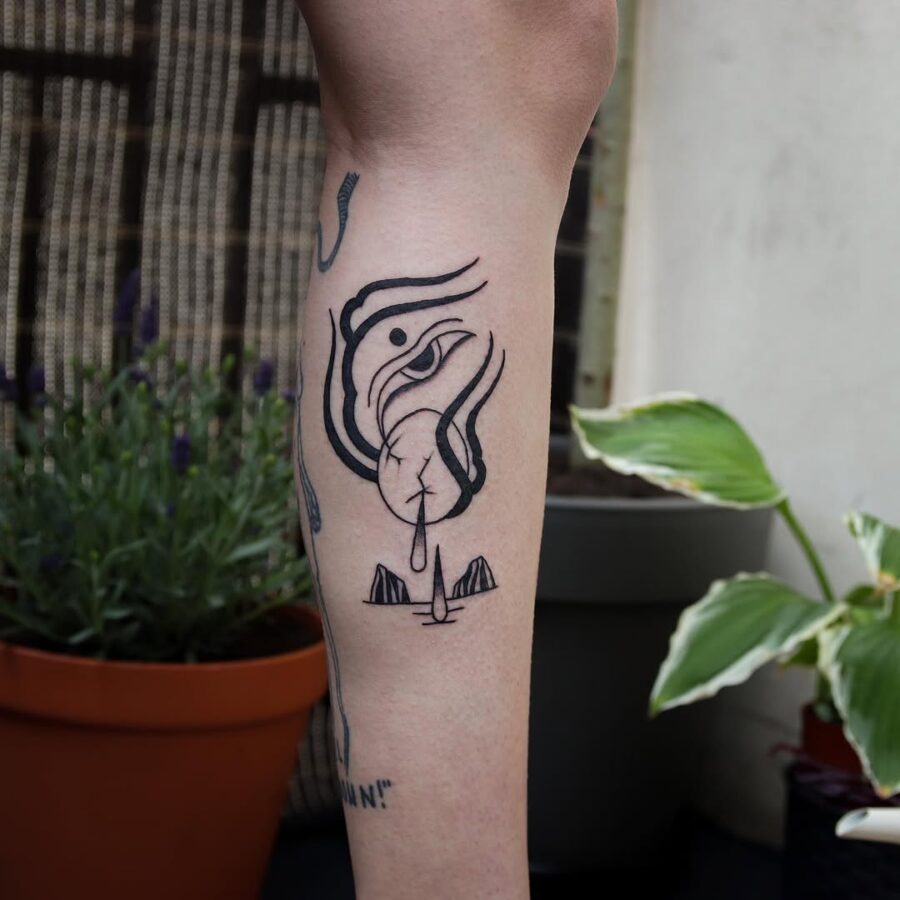 Unique abstract egg tattoo expressing femininity