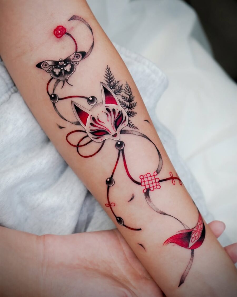 Intricate cat and butterfly tattoo design