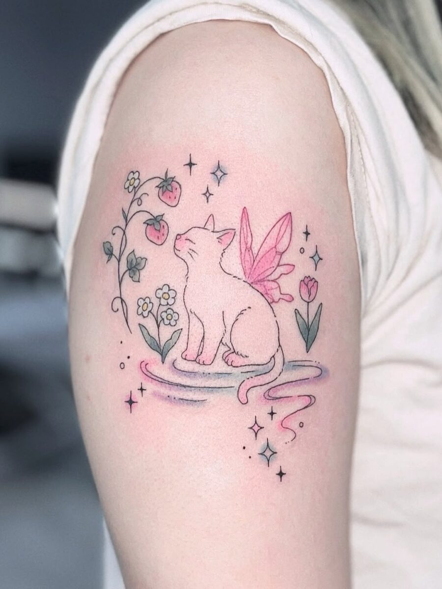 Whimsical cat tattoo with floral elements
