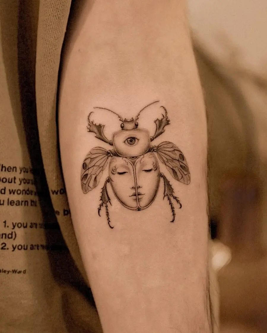 Mysterious insect-themed tattoo with artistic flair