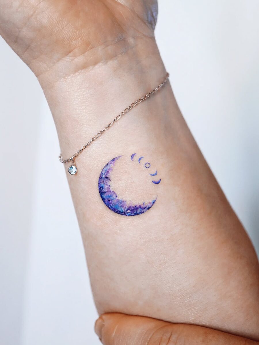 Elegant moon tattoo with cosmic waves