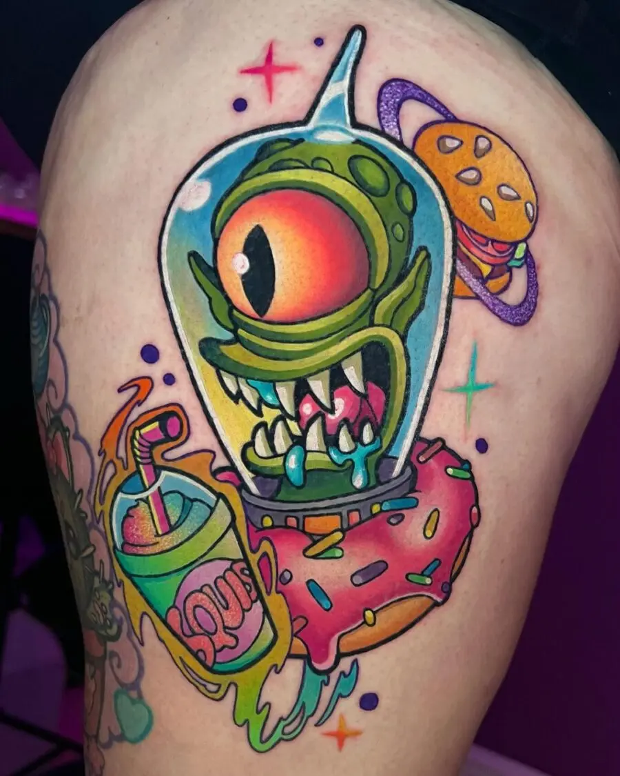 Vibrant alien tattoo with playful elements