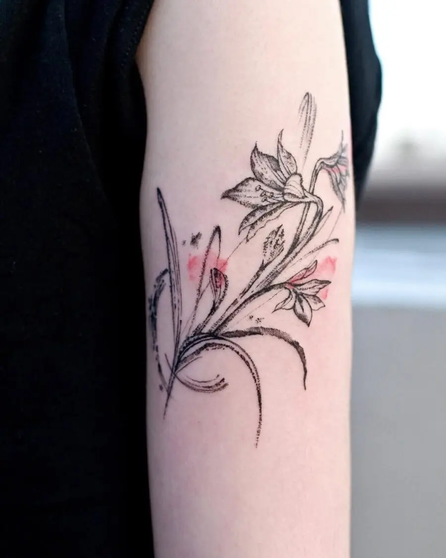 Delicate amaryllis tattoo with gentle colors