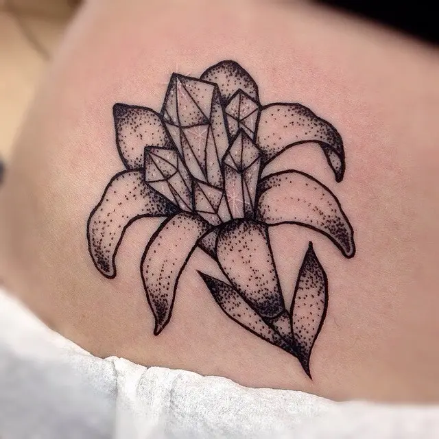 Stylish Amaryllis Tattoo with Geometric Crystals
