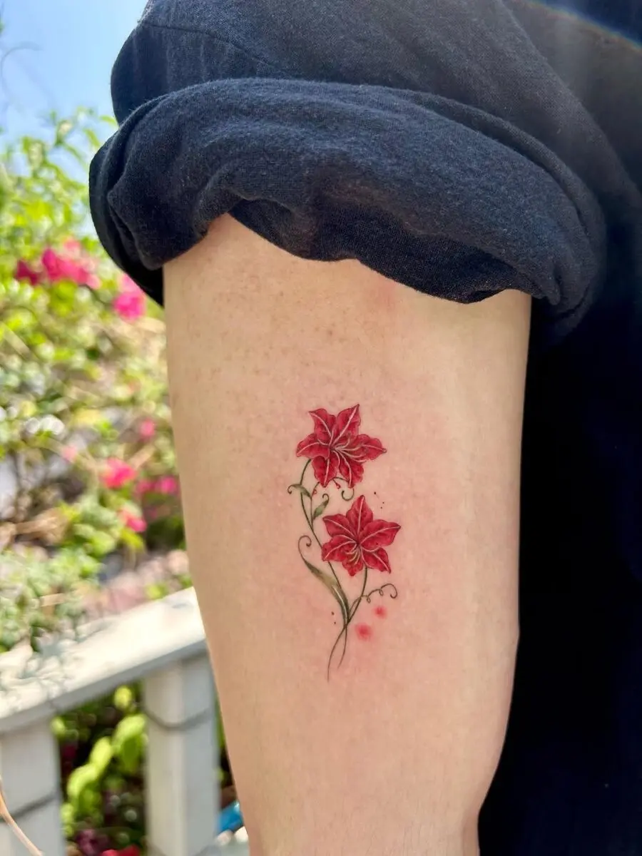 Elegant Red Amaryllis Tattoo Design