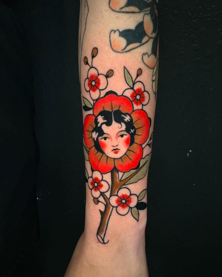 Vintage-inspired floral Americana tattoo design