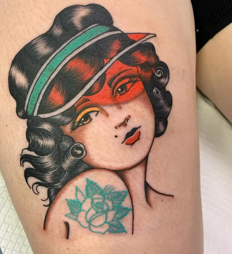 Vintage-inspired Americana tattoo with feminine flair