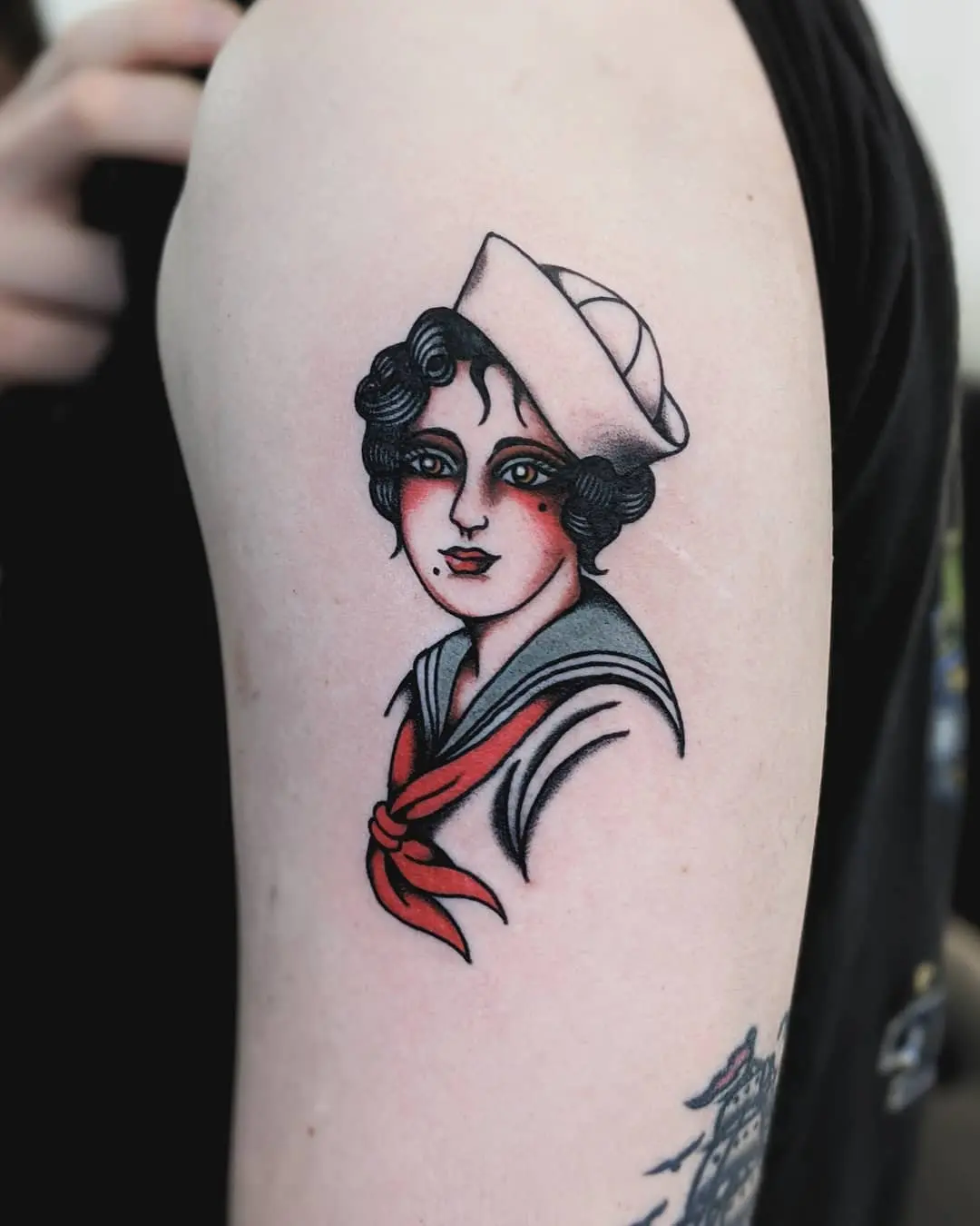 Vintage sailor girl tattoo with classic elements