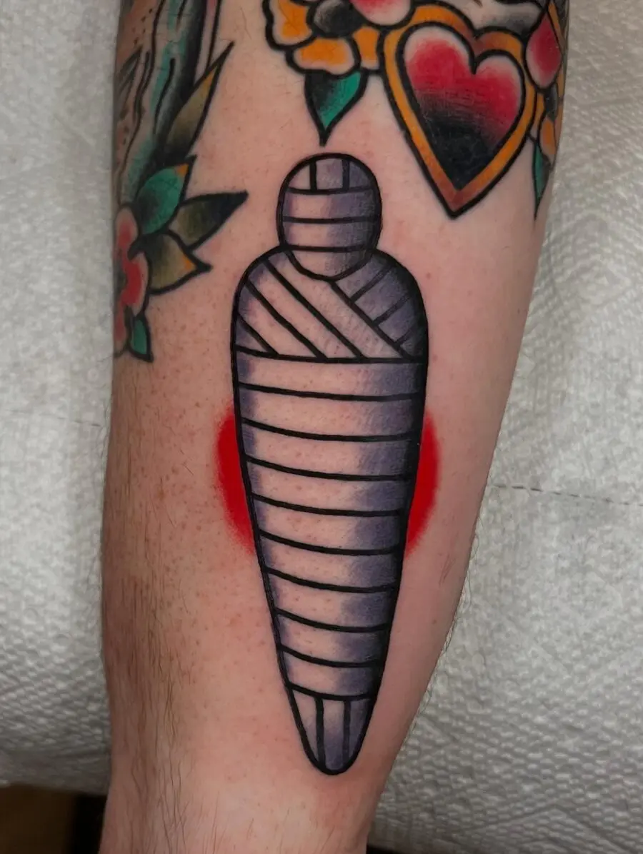 Unique vintage mummy tattoo with bold lines