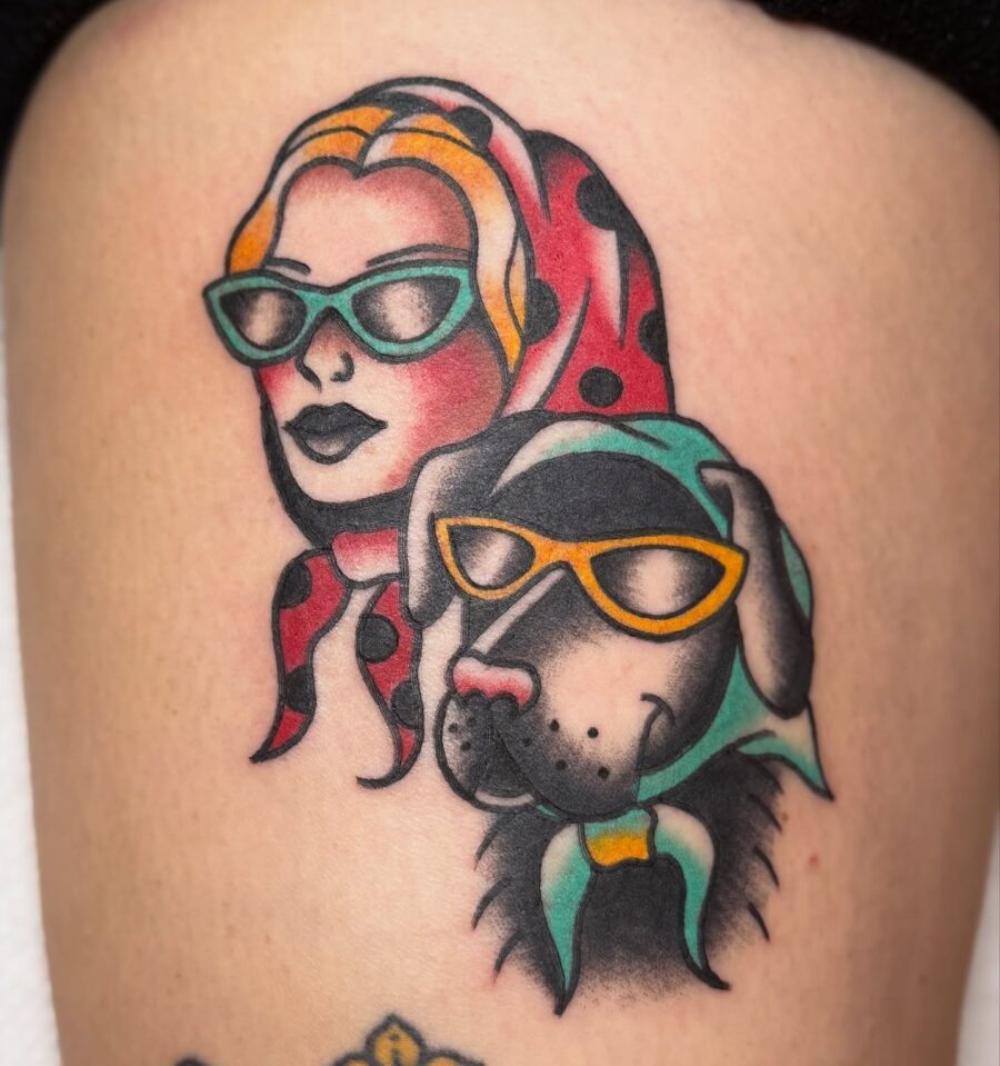 Stylish girl and dog sporting retro sunglasses