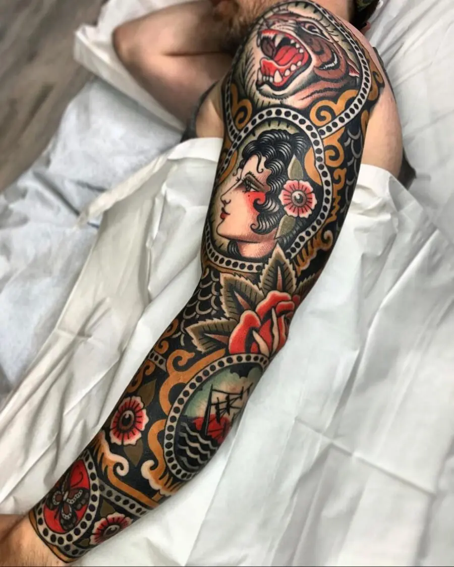 Intricate full sleeve tattoo showcasing Americana style