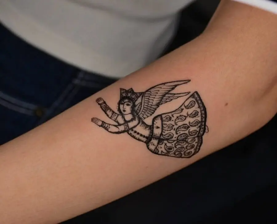 Intricate vintage angel tattoo with details