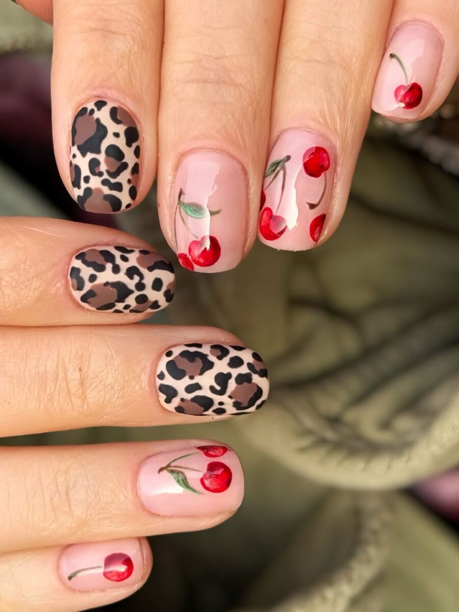 Chic Animal Print and Cherry Nail Design