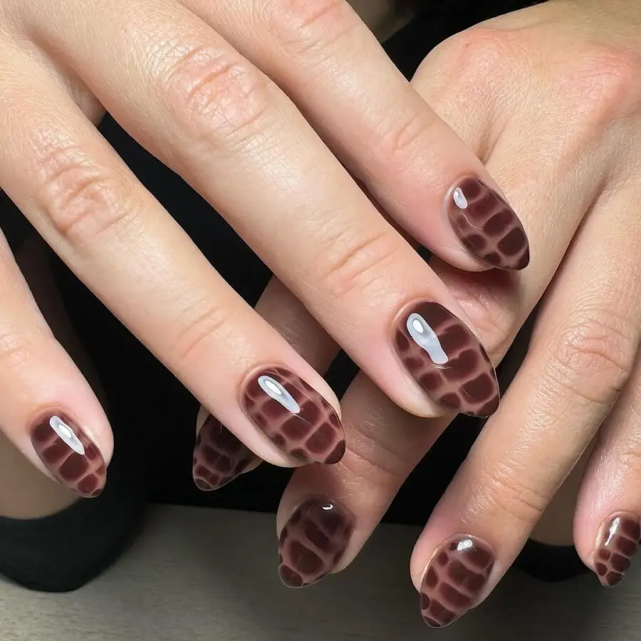 Sleek Brown Animal-Print Nail Design for Style