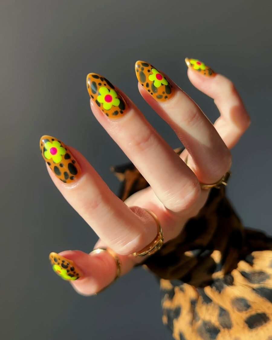Vibrant animal print nails with floral accents