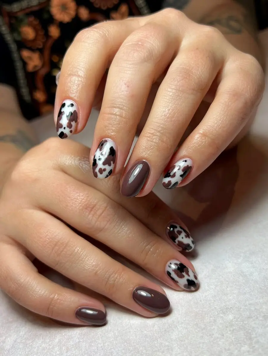 Chic cow print nails for trendy vibes