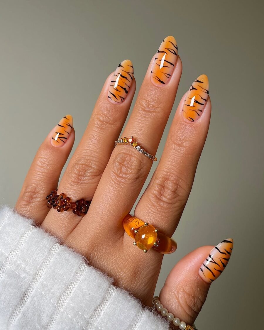 Bold Tiger-Inspired Animal Print Nails
