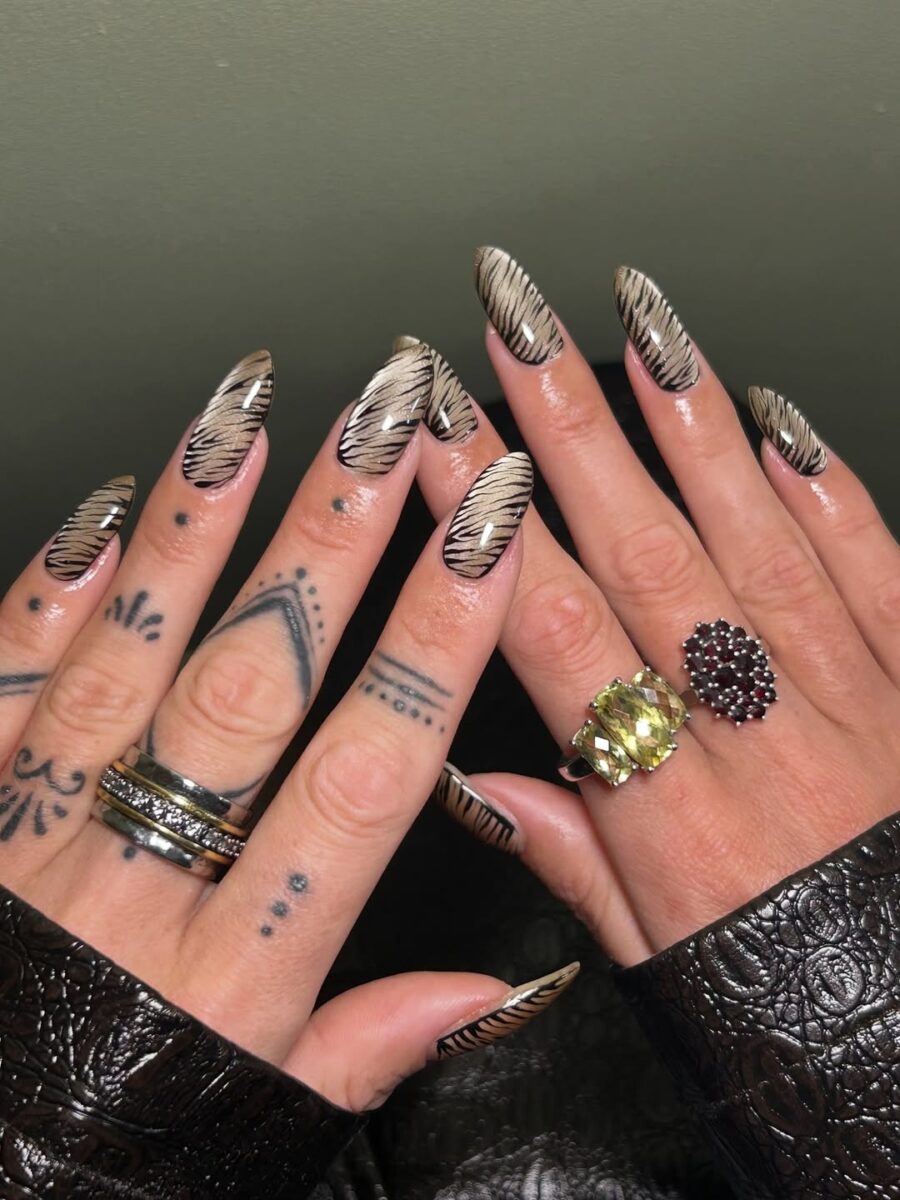 Stylish zebra-inspired animal print nails
