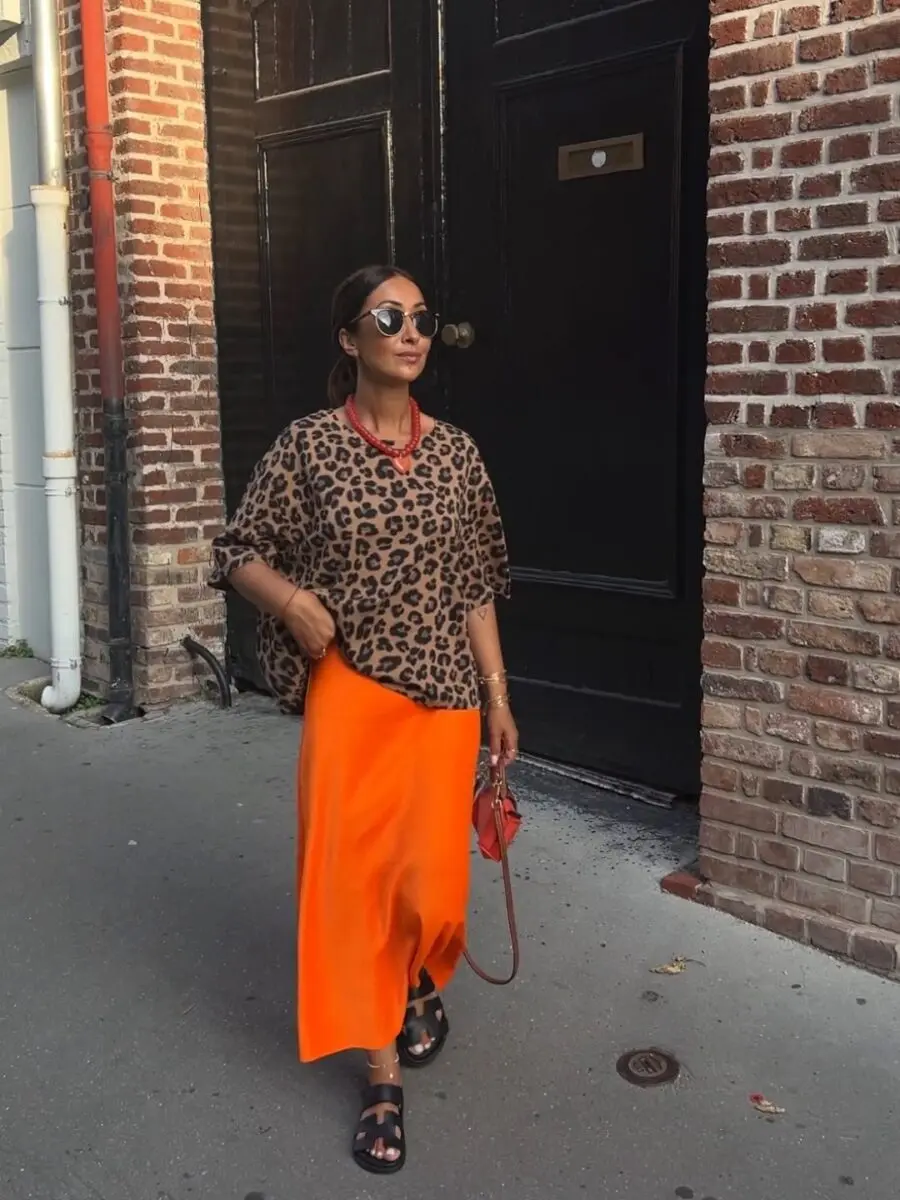 Bold Leopard Print Meets Vibrant Orange Skirt