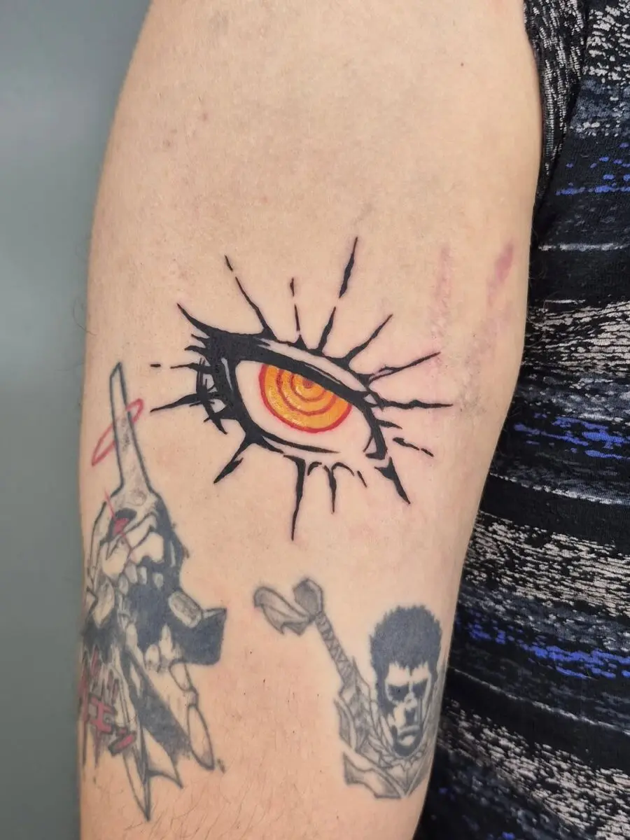 Striking anime eye tattoo with vivid details