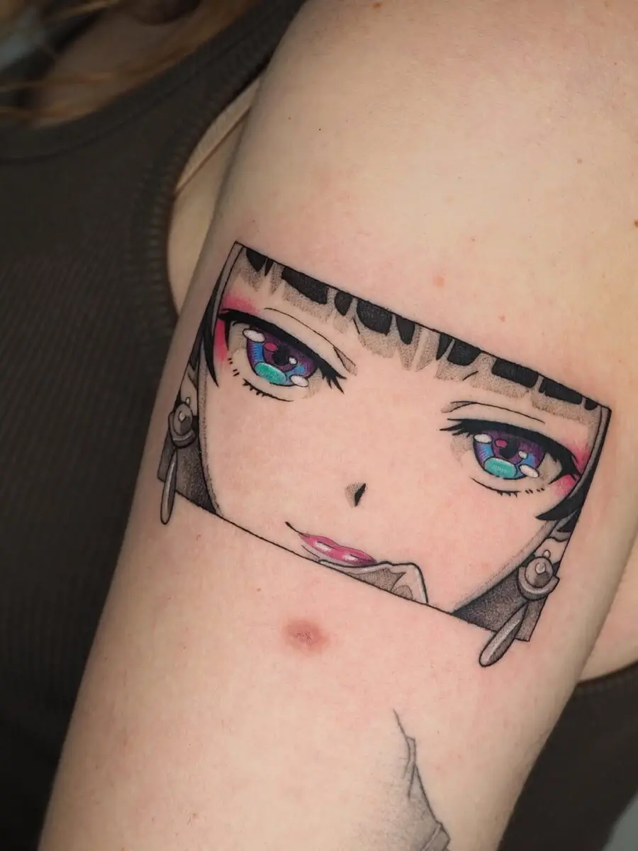 Vibrant anime eyes tattoo with captivating detail