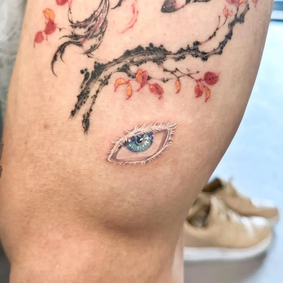 Realistic anime eye tattoo on skin