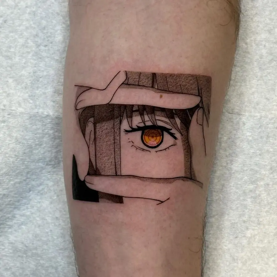 Unique anime eye tattoo with framing hands.