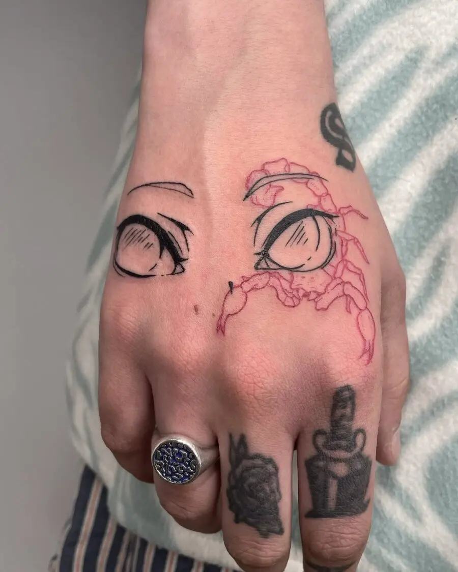 Intricate anime eye tattoo on hand