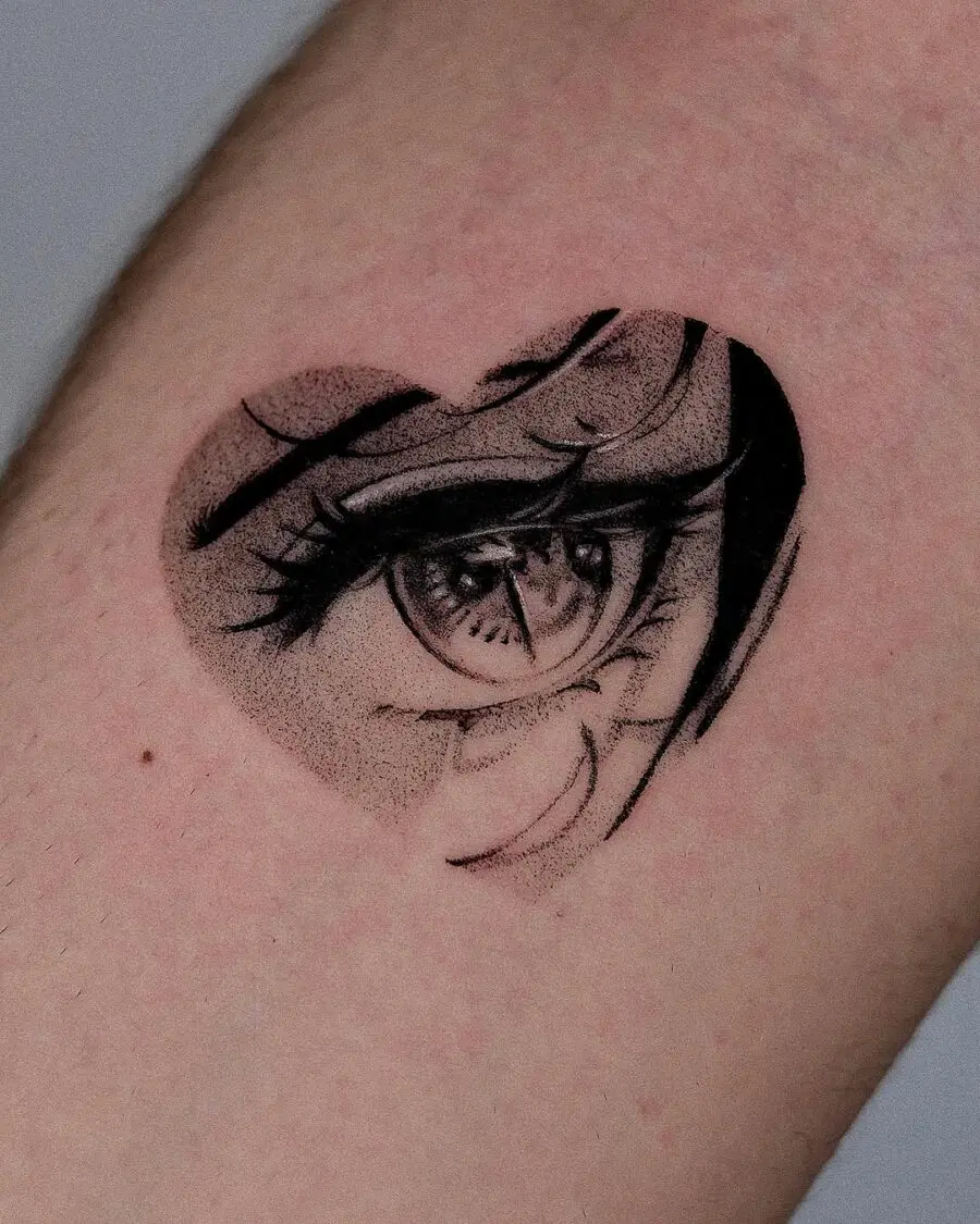Heart-shaped anime eye tattoo design
