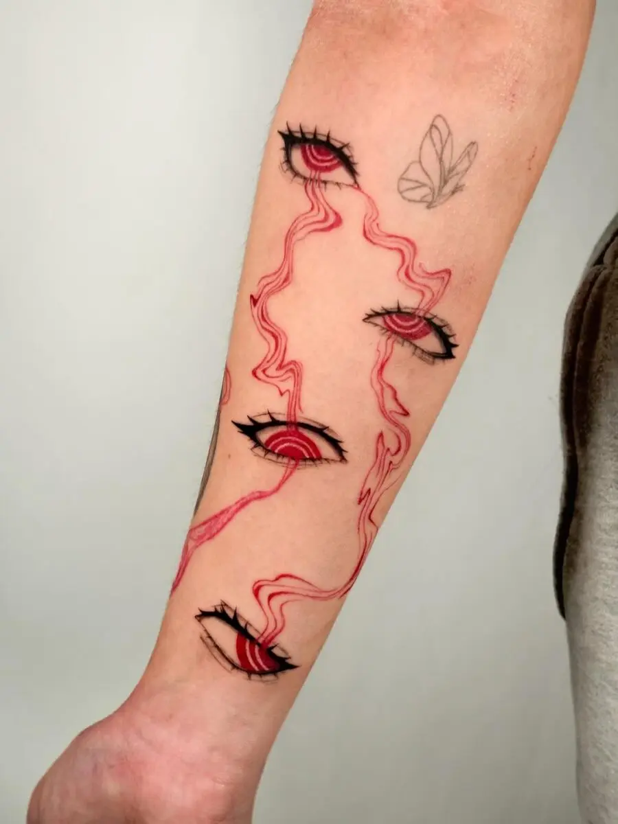 Striking Red Anime Eye Tattoo Design