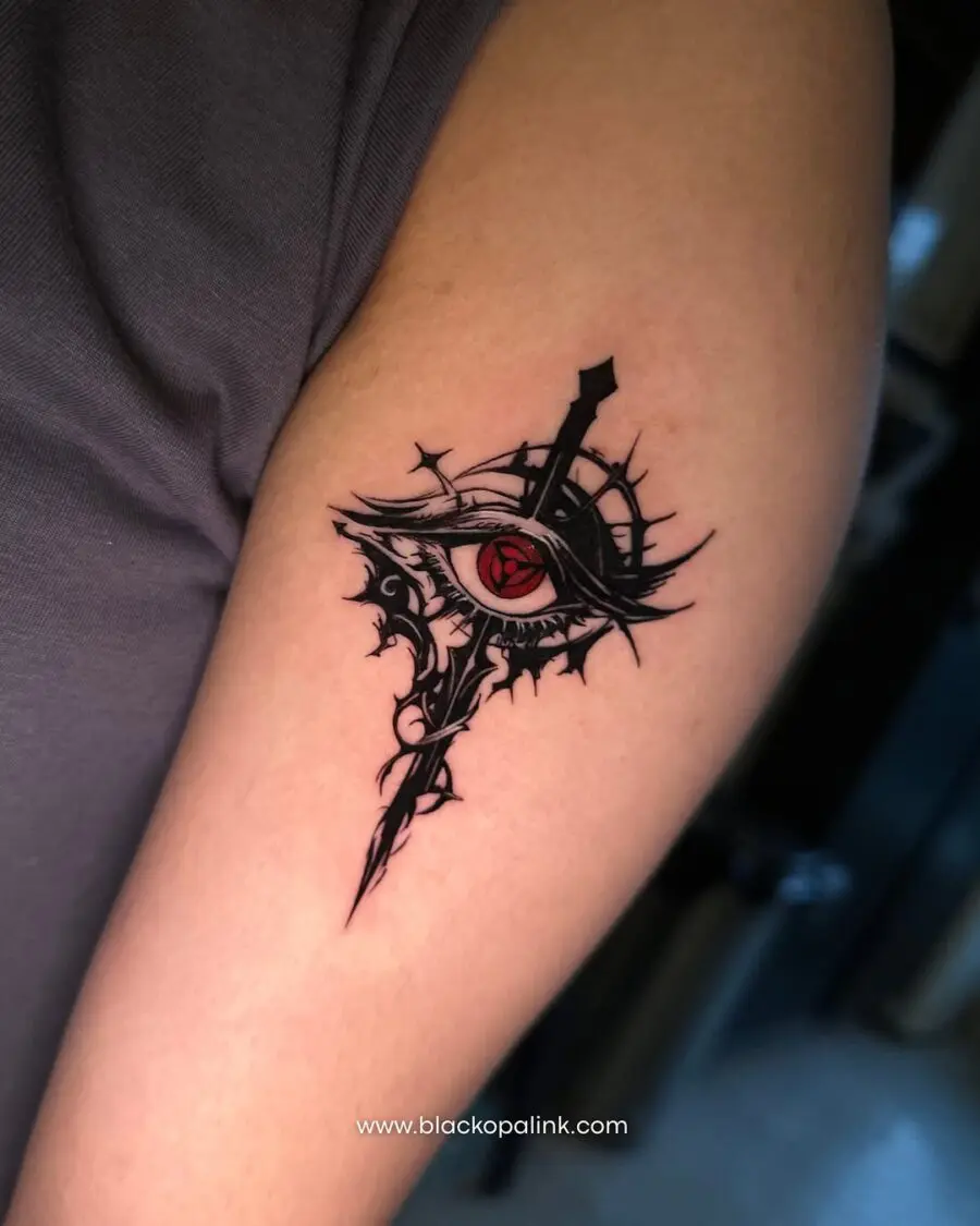 Intricate anime eye with sword tattoo design