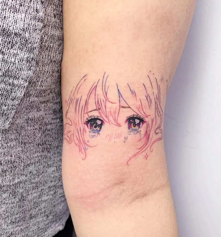 Charming and vibrant anime eye tattoo inspiration