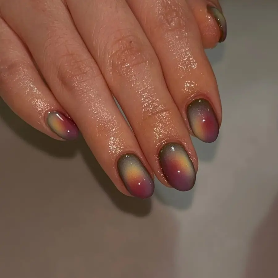 Stunning gradient aura nail design with shimmer