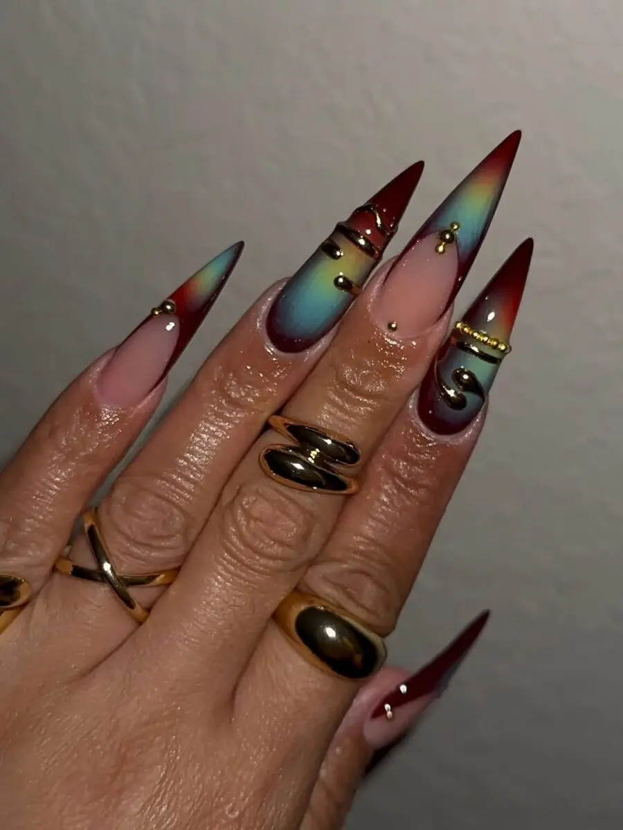 Stunning gradient stiletto aura nails