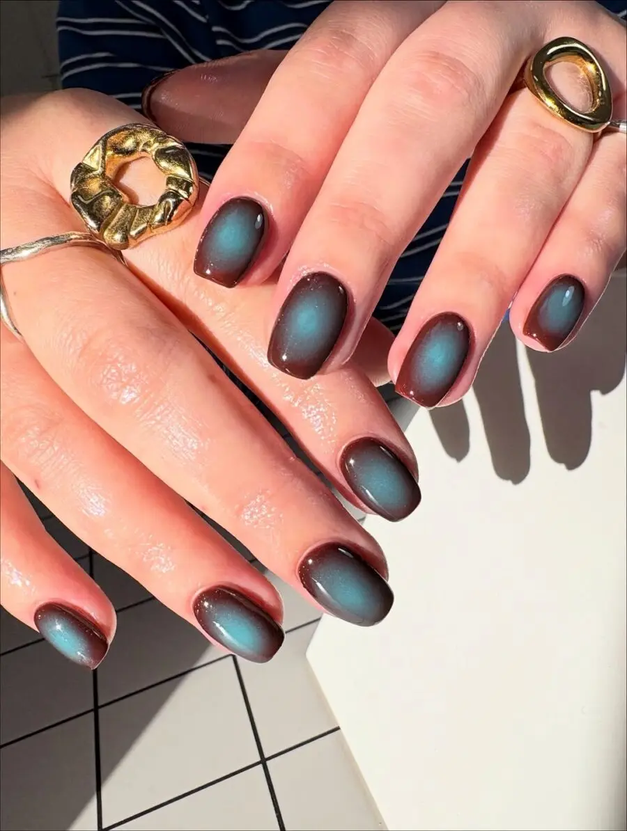 Stunning gradient aura nails with chic accents