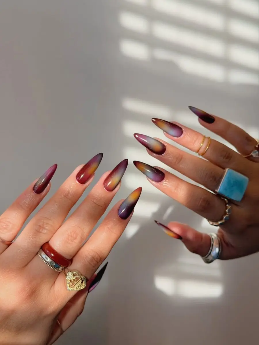 Stunning ombre aura nails in rich hues
